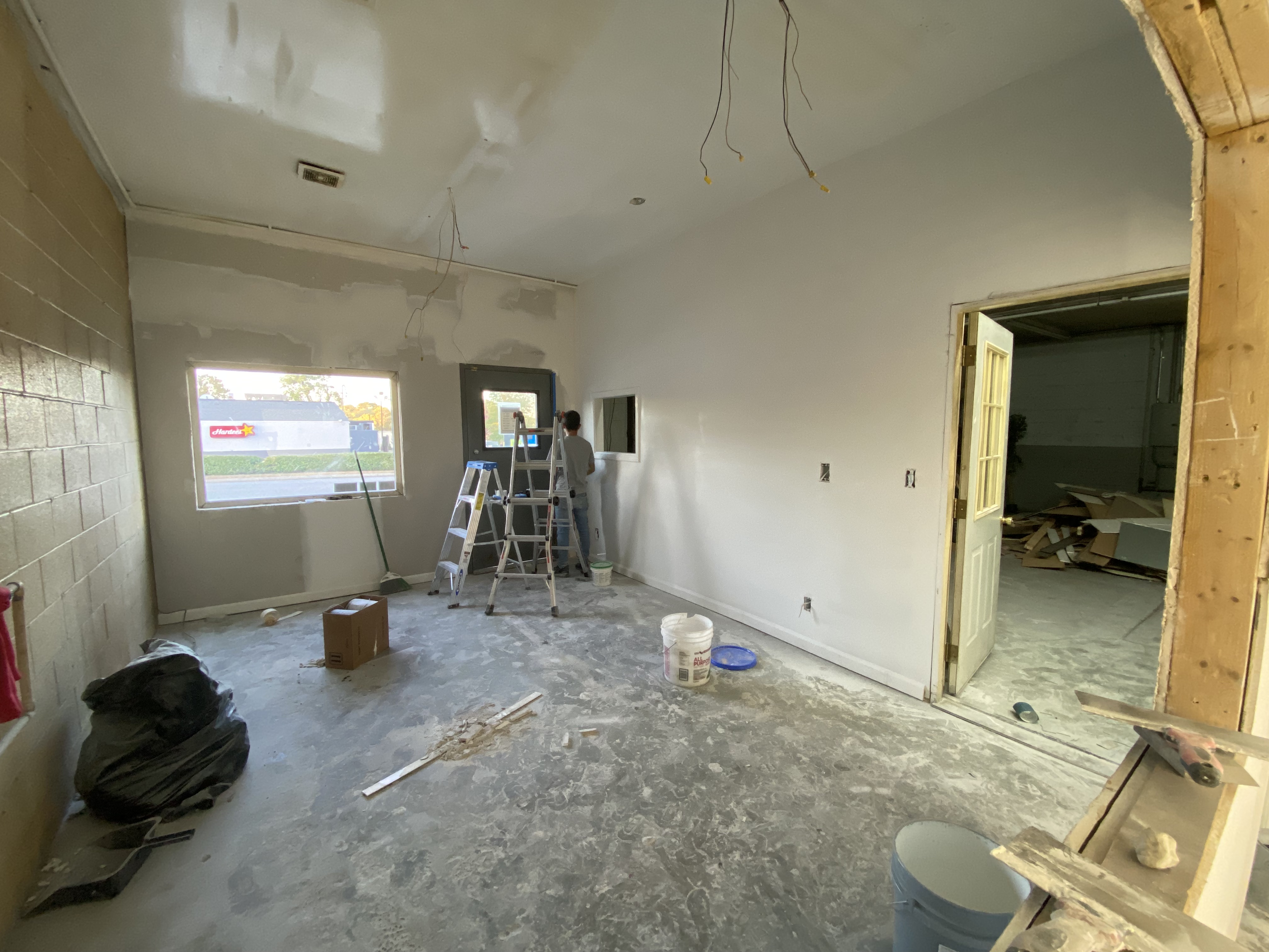 Room mid-renovation with fresh paint