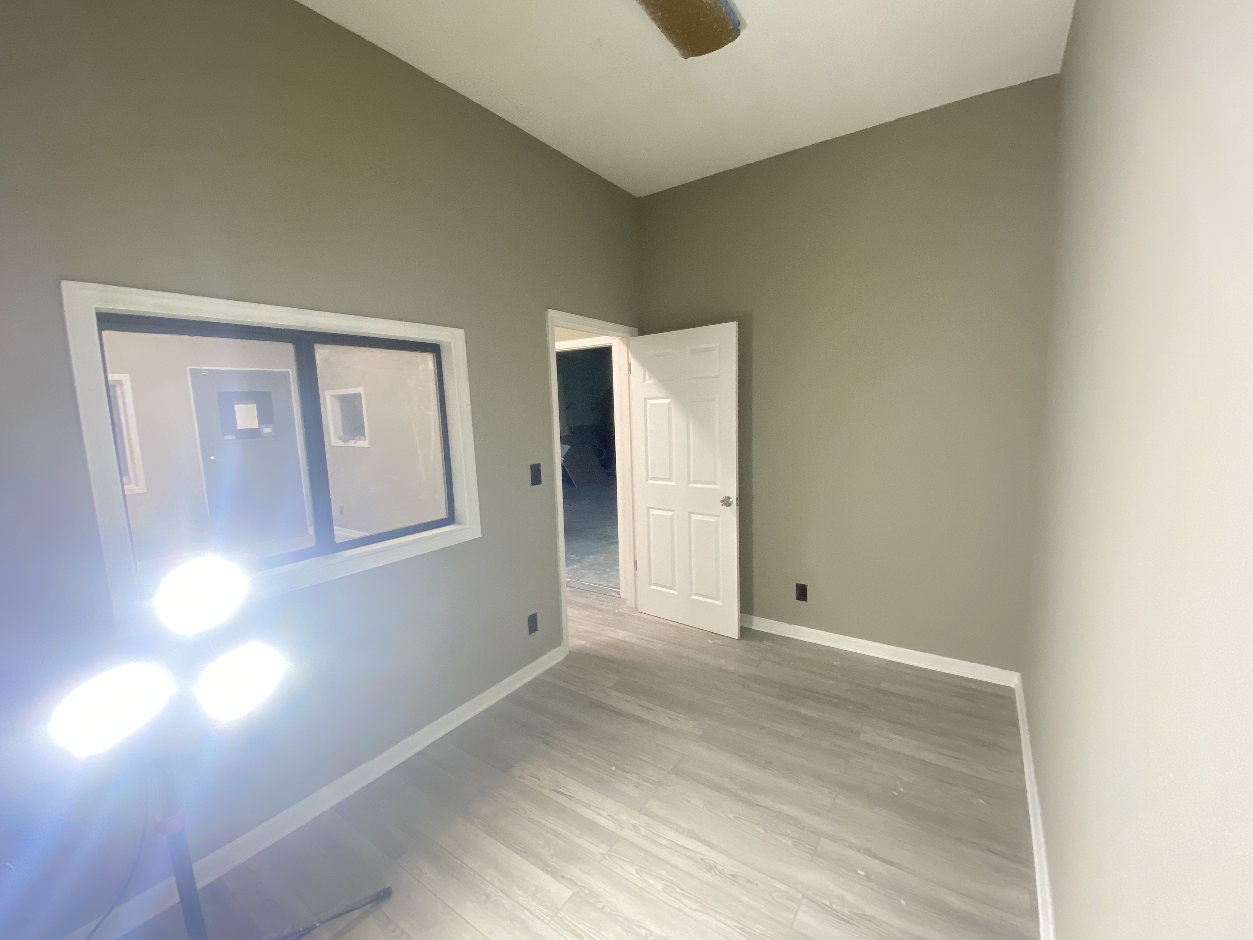 Finished room with painted walls and new floor